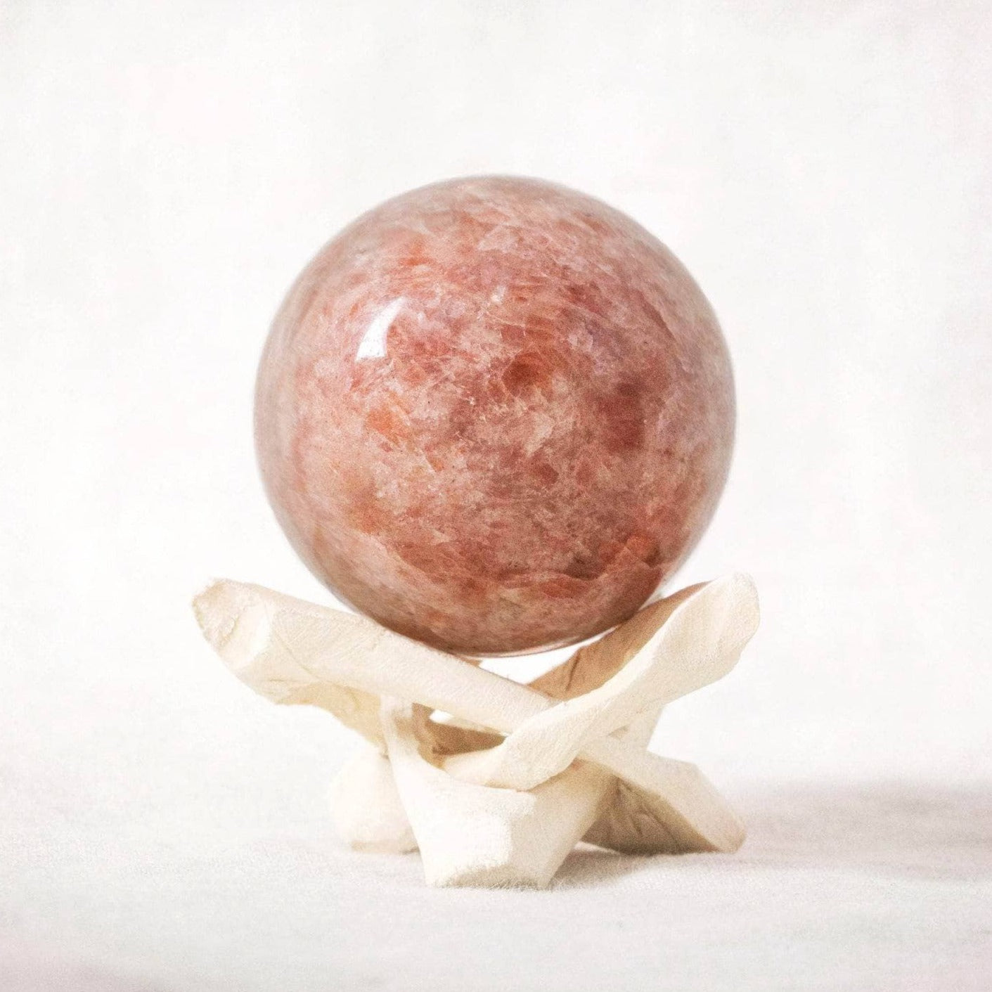 Sunstone Sphere with Tripod Sunstone Sphere with Tripod