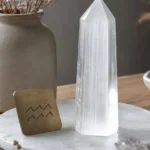 Aquarius March 2026 monthly horoscope with Selenite as crystal of the month, zodiac symbol ♒