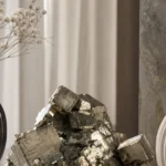 Aquarius May 2026 monthly horoscope with Pyrite as crystal of the month, zodiac symbol ♒