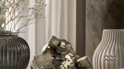 Aquarius May 2026 monthly horoscope with Pyrite as crystal of the month, zodiac symbol ♒