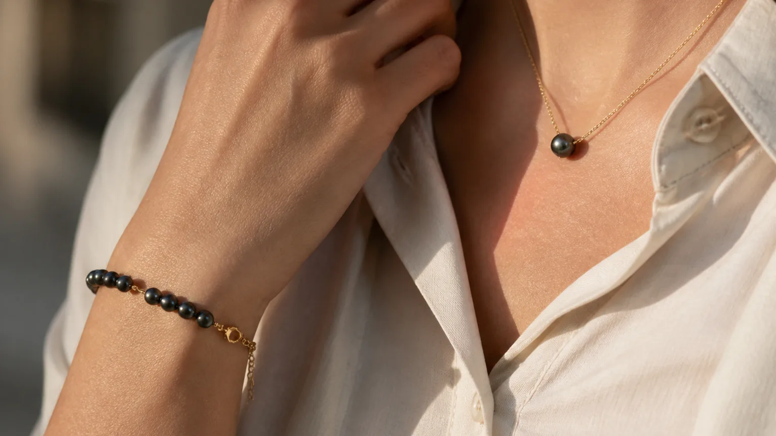 Black Pearl Meaning: Healing Properties & Uses 4 Black pearl worn for calm and quiet inner strength