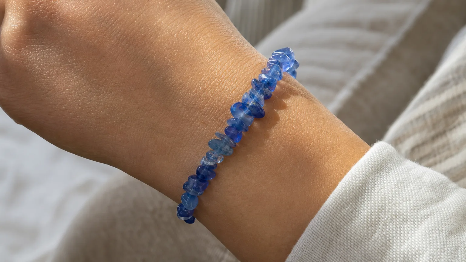 Blue Quartz Meaning: Healing Properties & Uses 5 Blue quartz bracelet worn on the wrist for daily calm
