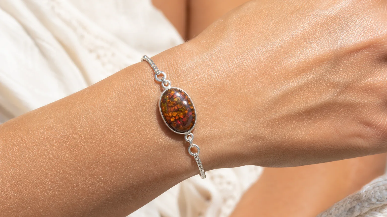 Fire Agate Meaning: Healing Properties & Uses 5 Fire agate cabochon worn for daily use