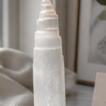 Gemini December 2026 monthly horoscope with Selenite as crystal of the month, zodiac symbol ♊