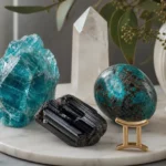 Gemini and Gemini compatibility with Apatite, Chrysocolla, and Black Tourmaline crystals arranged with zodiac symbols ♊ and ♊
