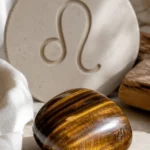 Leo September 2026 monthly horoscope with Tiger's Eye as crystal of the month, zodiac symbol ♌