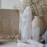 Libra December 2026 monthly horoscope with Selenite as crystal of the month, zodiac symbol ♎