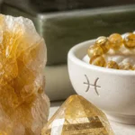 Pisces May 2026 monthly horoscope with Citrine as crystal of the month, zodiac symbol ♓