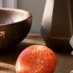 Sagittarius August 2026 monthly horoscope with Sunstone as crystal of the month, zodiac symbol ♐