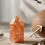 Sagittarius June 2026 monthly horoscope with Sunstone as crystal of the month, zodiac symbol ♐