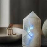 Scorpio March 2026 monthly horoscope with Moonstone as crystal of the month, zodiac symbol ♏