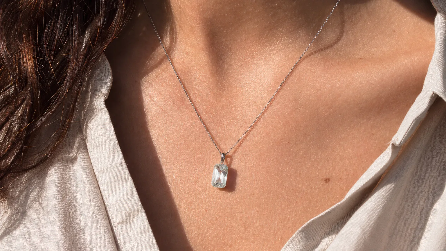 Spodumene faceted pendant worn for daily wear