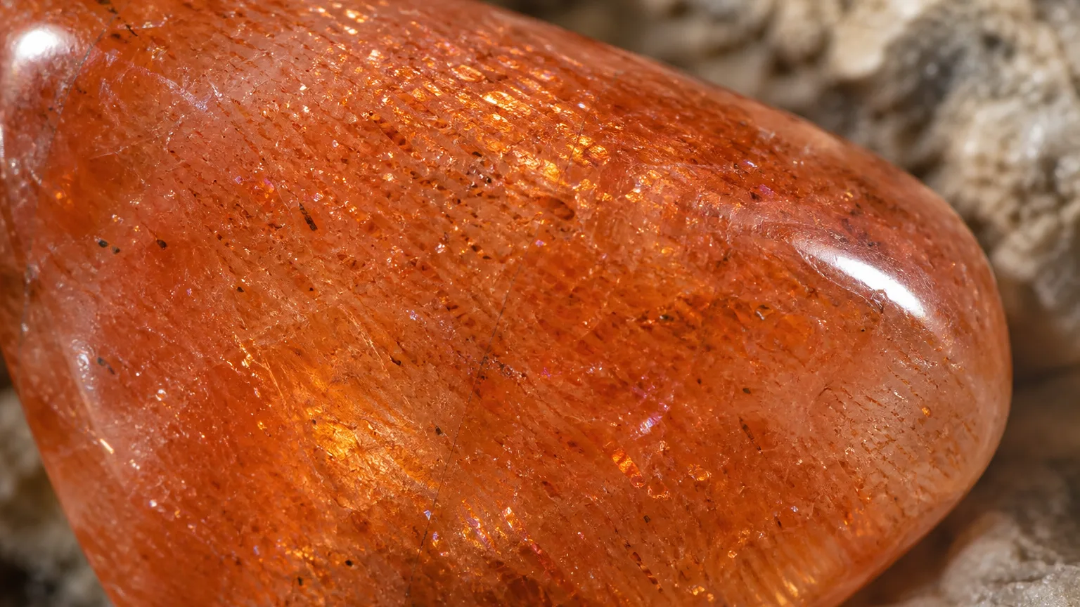 Sunstone Meaning: Healing Properties & Uses 2 Sunstone orange spangled aventurescent feldspar close-up